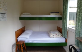 Backpackers Budget Cabin double bed and bunk